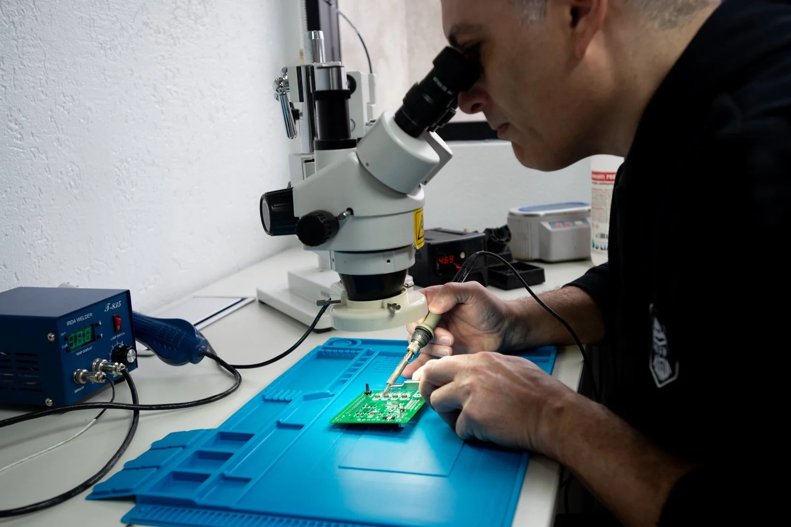 Testing and rework under the microscope before the unit ships to the field.